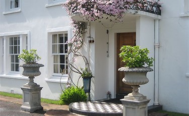 Entrance crowned with flowers